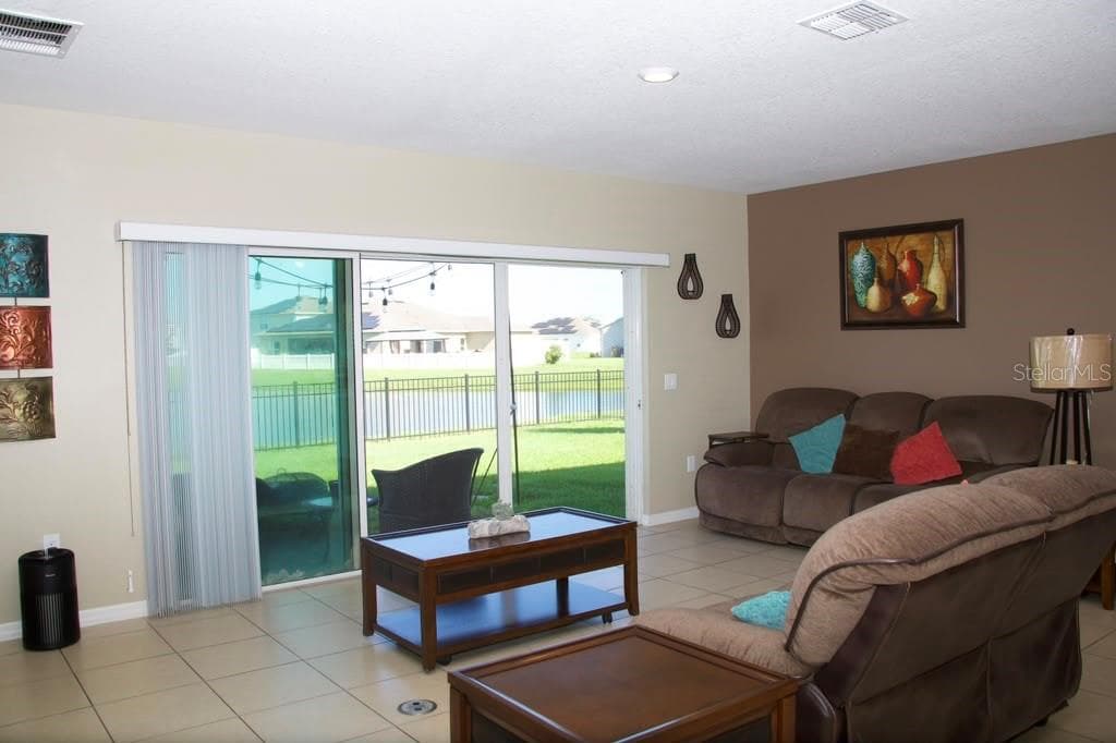 Triple door slidingdoor - 411 BLUE LAKE CIR, KISSIMMEE