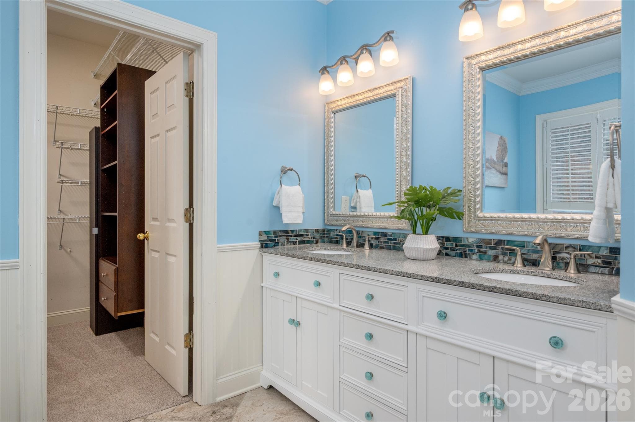 This beautiful remodeled bath offers a feeling of tranquility. - 12818 Darby Chase Drive, Charlotte