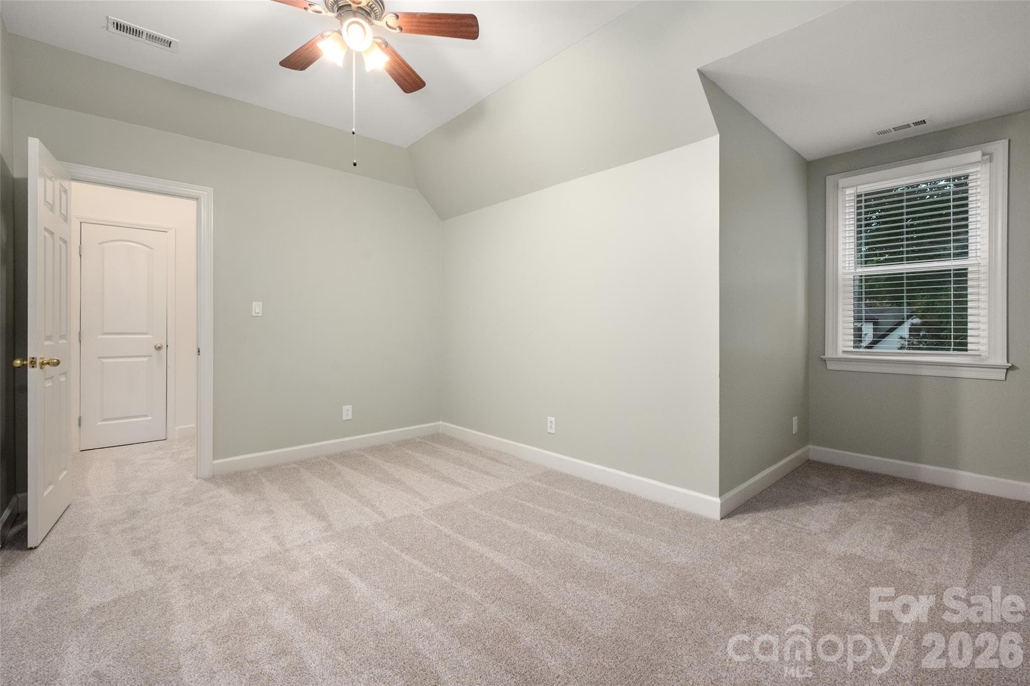 2nd upstairs bedroom with access to a large storage area - 12818 Darby Chase Drive, Charlotte