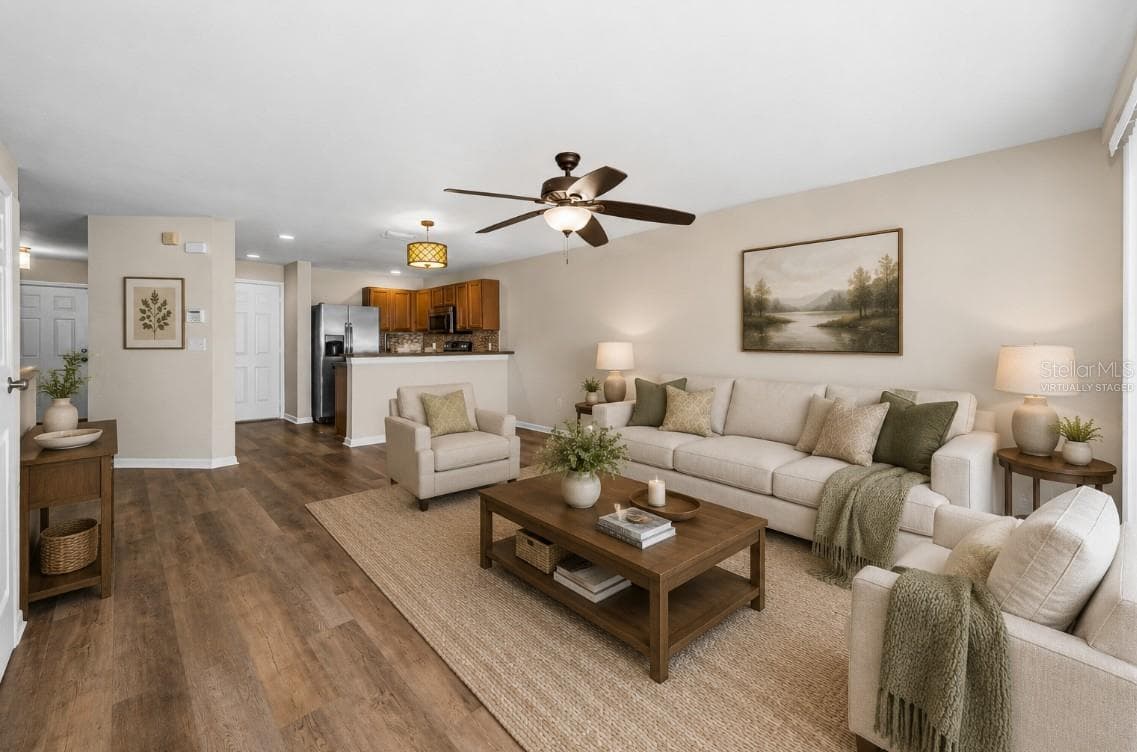 Virtually Staged Living Room to Kitchen - 8013 SUTTON TERRACE LN, TAMPA