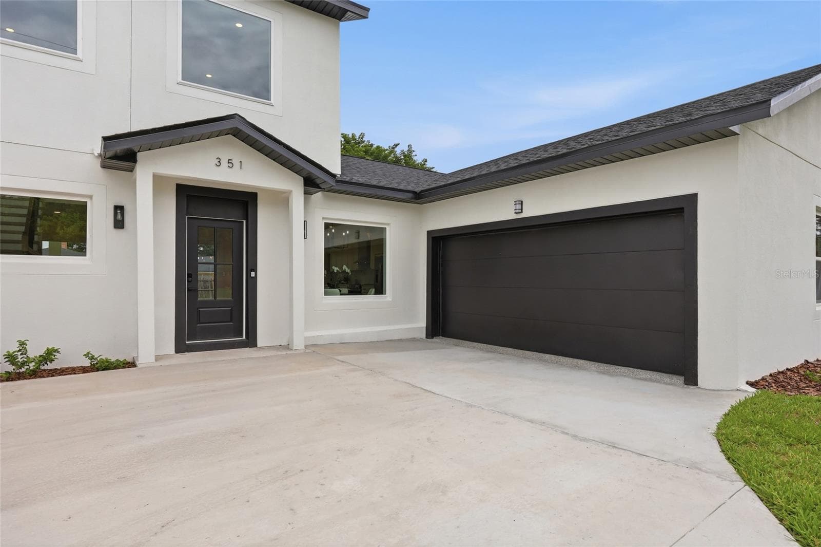 Front entrance and attached garage - 351 E WILDMERE AVE, LONGWOOD