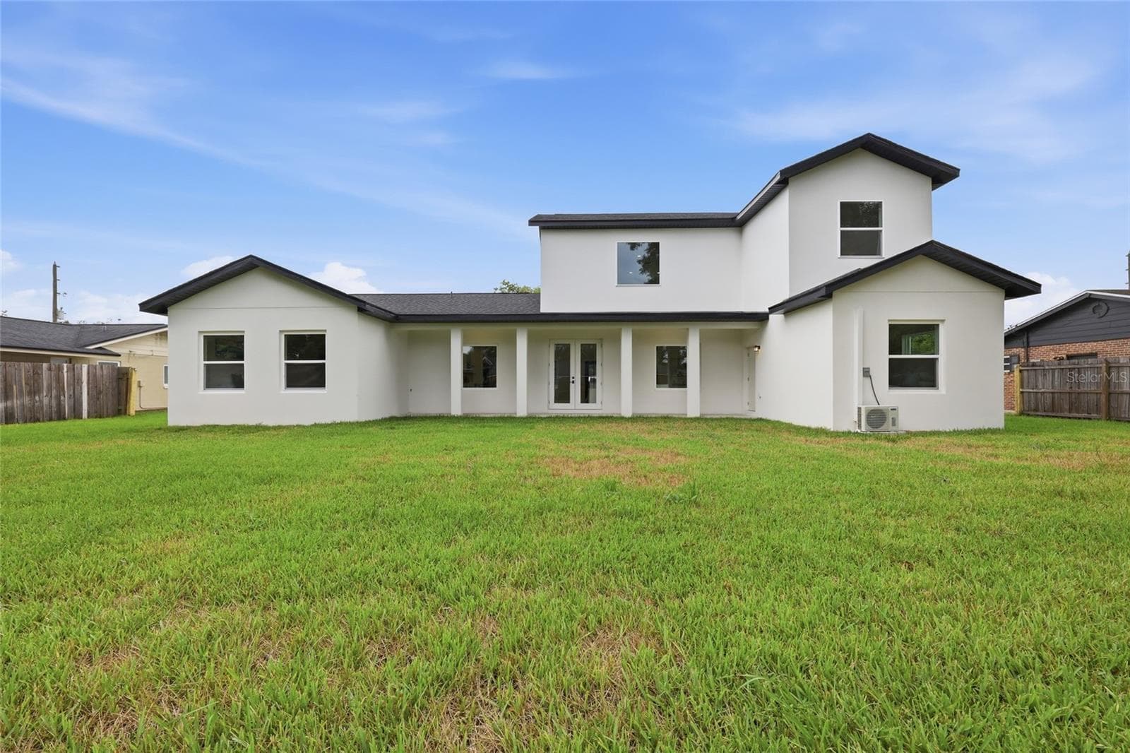 Rear exterior, full elevation - 351 E WILDMERE AVE, LONGWOOD