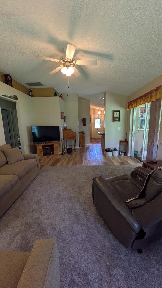 Family Room with large sliding doors. Brings in lots of natural light. 267 N Orange Ave Lake Helen - 267 N ORANGE AVE, LAKE HELEN