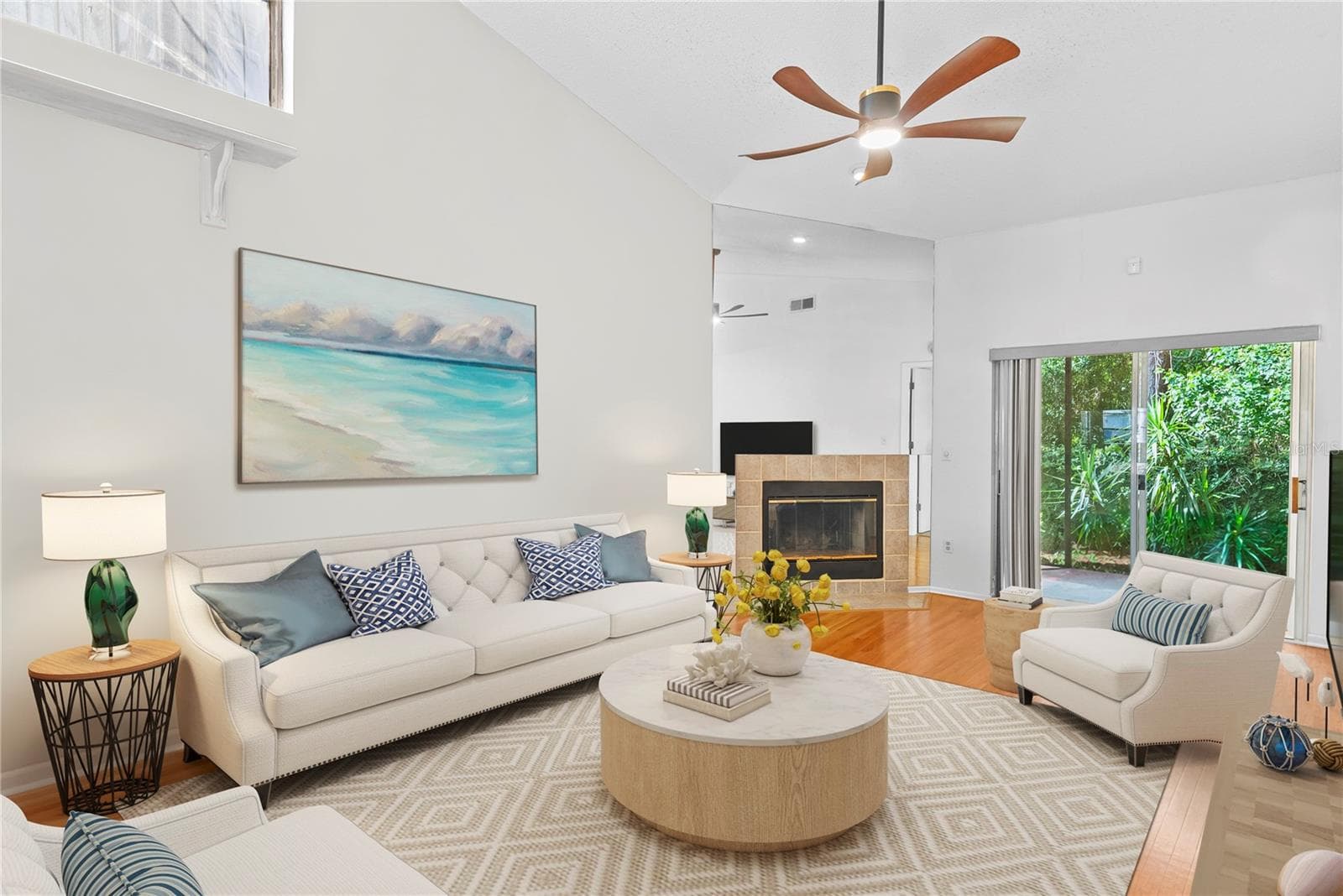 Living room staged with neutral colors and modern furniture - 8601 TWIN FARMS PL, TAMPA