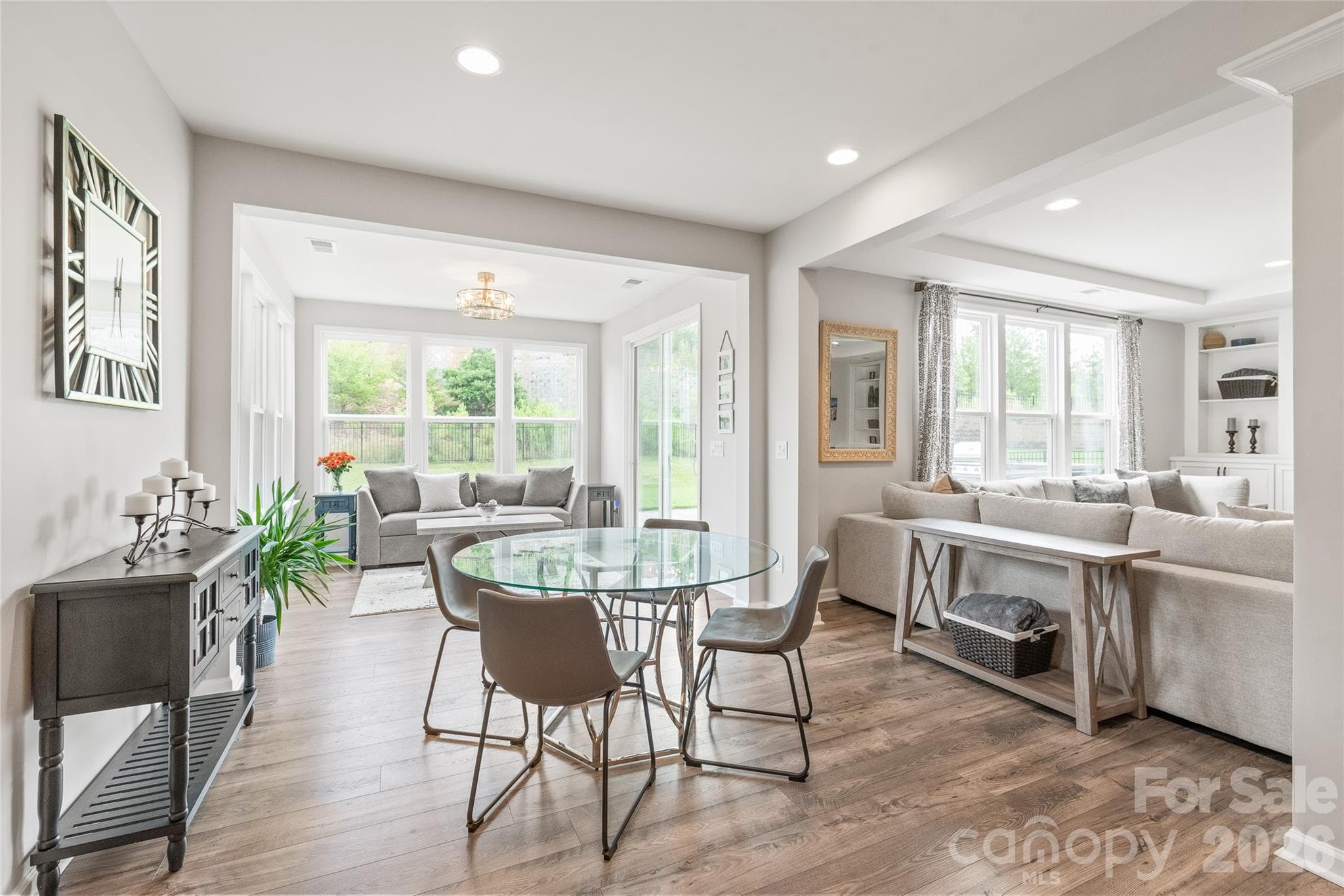 Flanked by natural light, the cheerful breakfast area provides the perfect sunlit nook for casual morning coffee and relaxed everyday meals. - 6440 Ancient Way, Fort Mill
