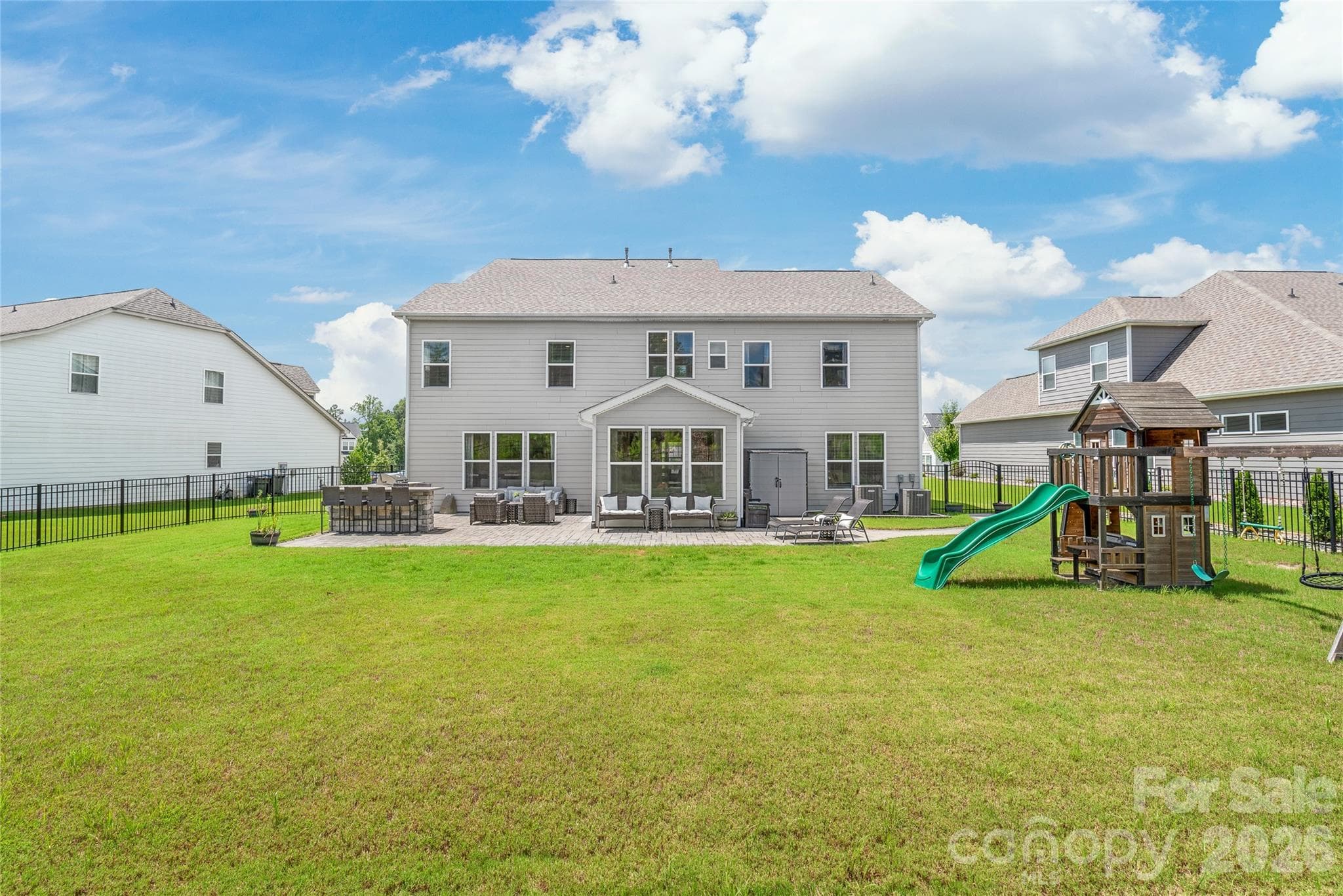 Endless green space and a convenient storage shed to keep your outdoor tools tucked away. - 6440 Ancient Way, Fort Mill