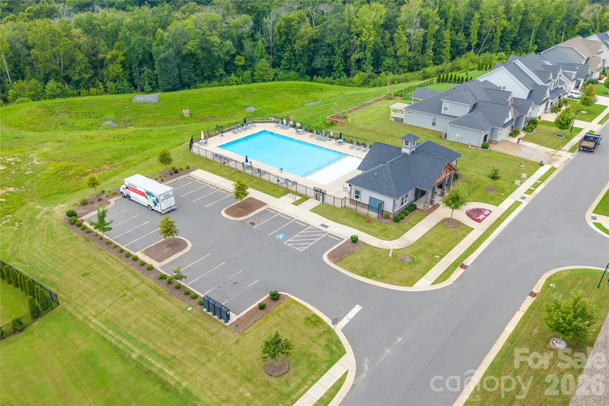 Enjoy resort-style living right at home with access to the community pool and cabana...perfect for summer relaxation. - 6440 Ancient Way, Fort Mill