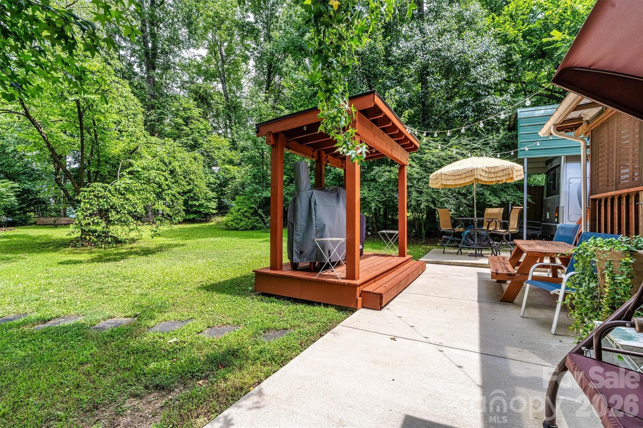 Backyard landscape with Grill Canopy - 7697 Katherine Drive, Denver