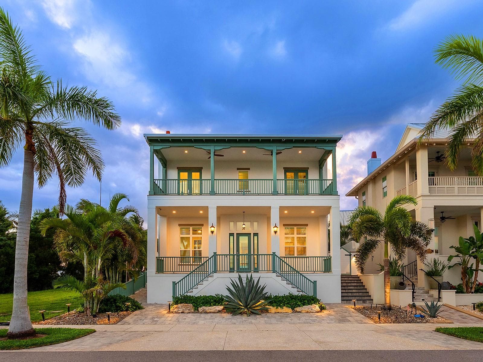 Elevated home has unobstructed water views, two river-facing outdoor covered spaces, and a 3-car garage with in-law suite in the rear - 4024 11TH STREET CT W, PALMETTO
