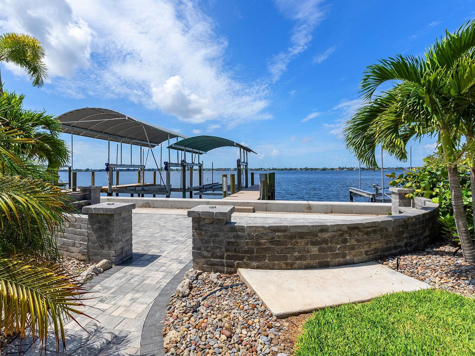 Enjoy cocktails on your paver terrace leading directly to the new dock equipped with water and electricity - 4024 11TH STREET CT W, PALMETTO