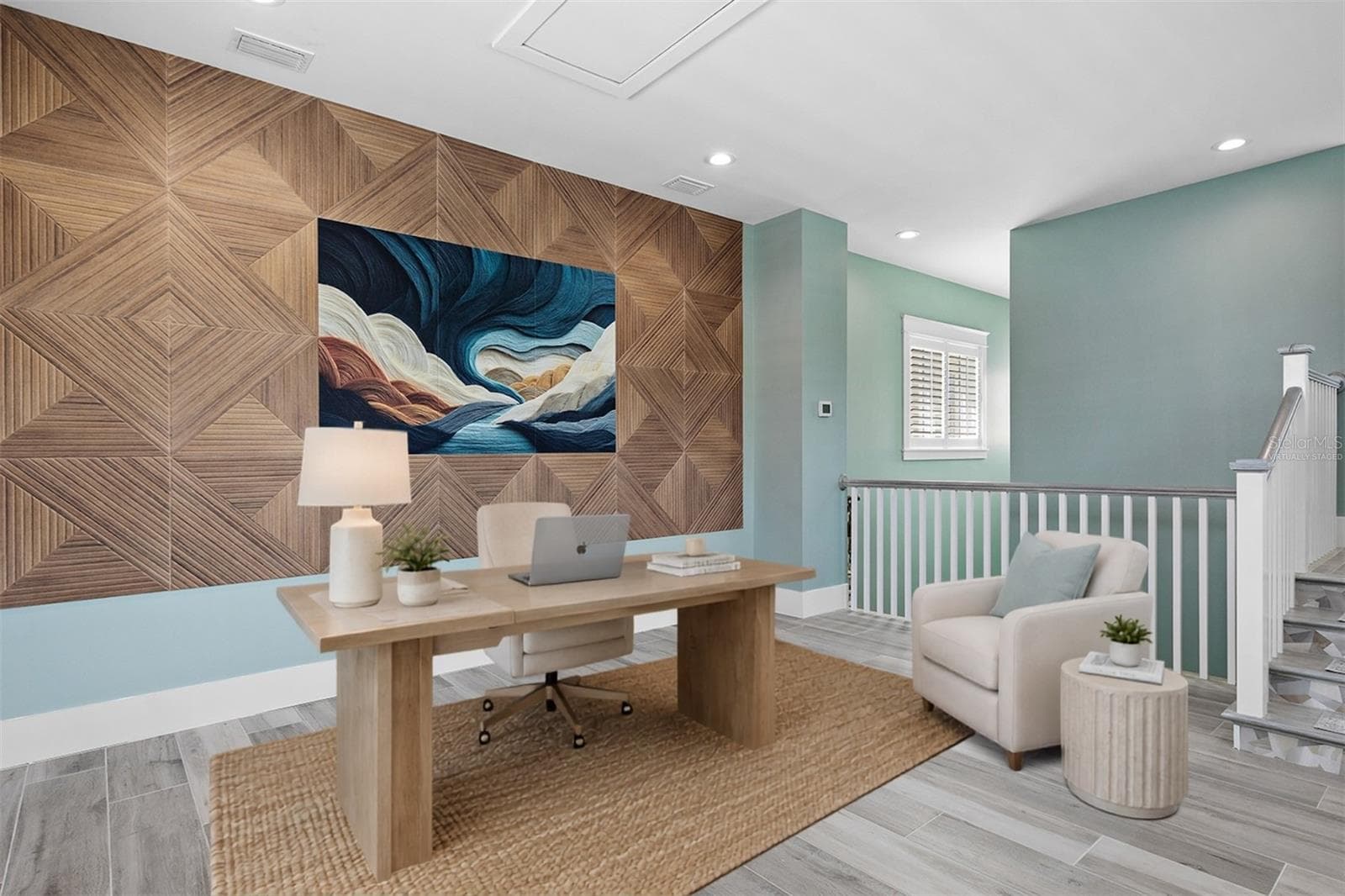 Virtually staged second floor study/den featuring a wood-accent wall, dedicated office space, and an open stair landing - 4024 11TH STREET CT W, PALMETTO