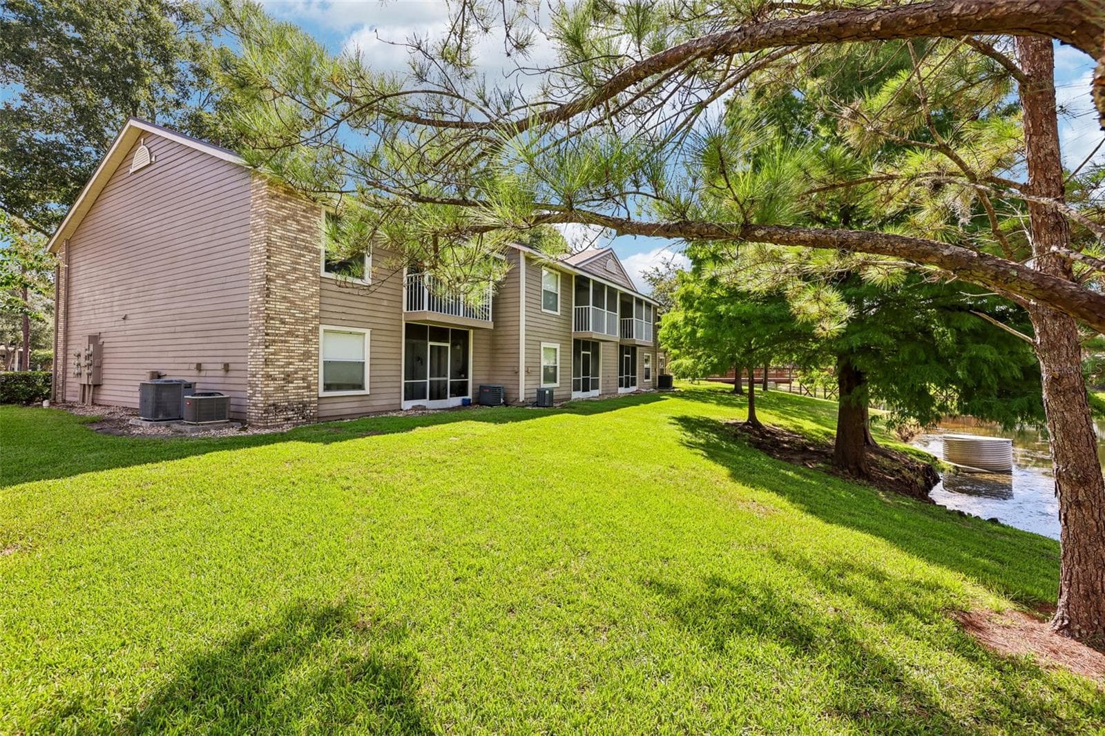 Enjoy well kept green spaces, mature trees... - 124 RESERVE CIR #100, OVIEDO