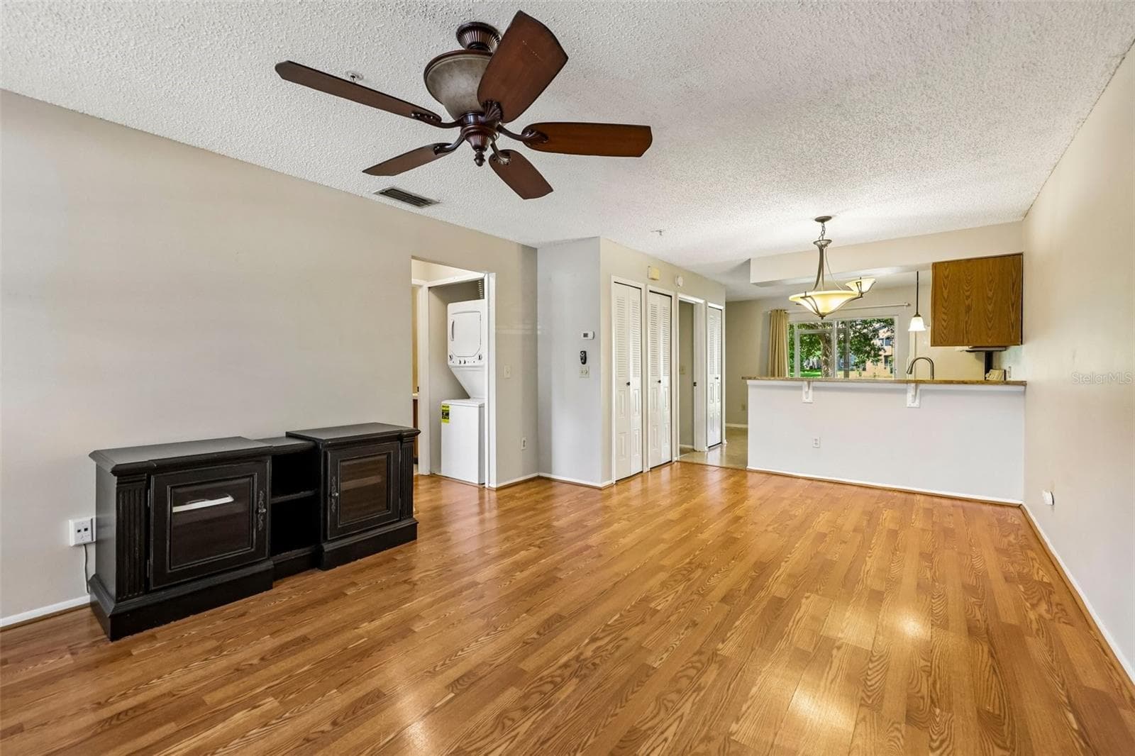 Open living and dining. - 124 RESERVE CIR #100, OVIEDO