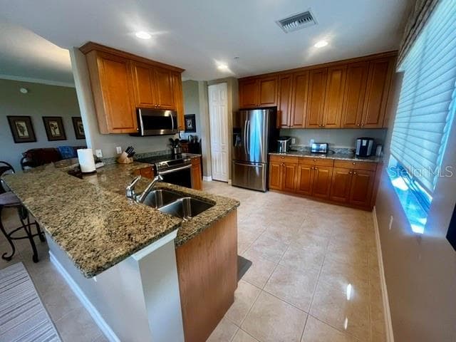 Kitchen features ample wood cabinets, granite countertops and SS appliances. - 88 VIVANTE BLVD #8822, PUNTA GORDA
