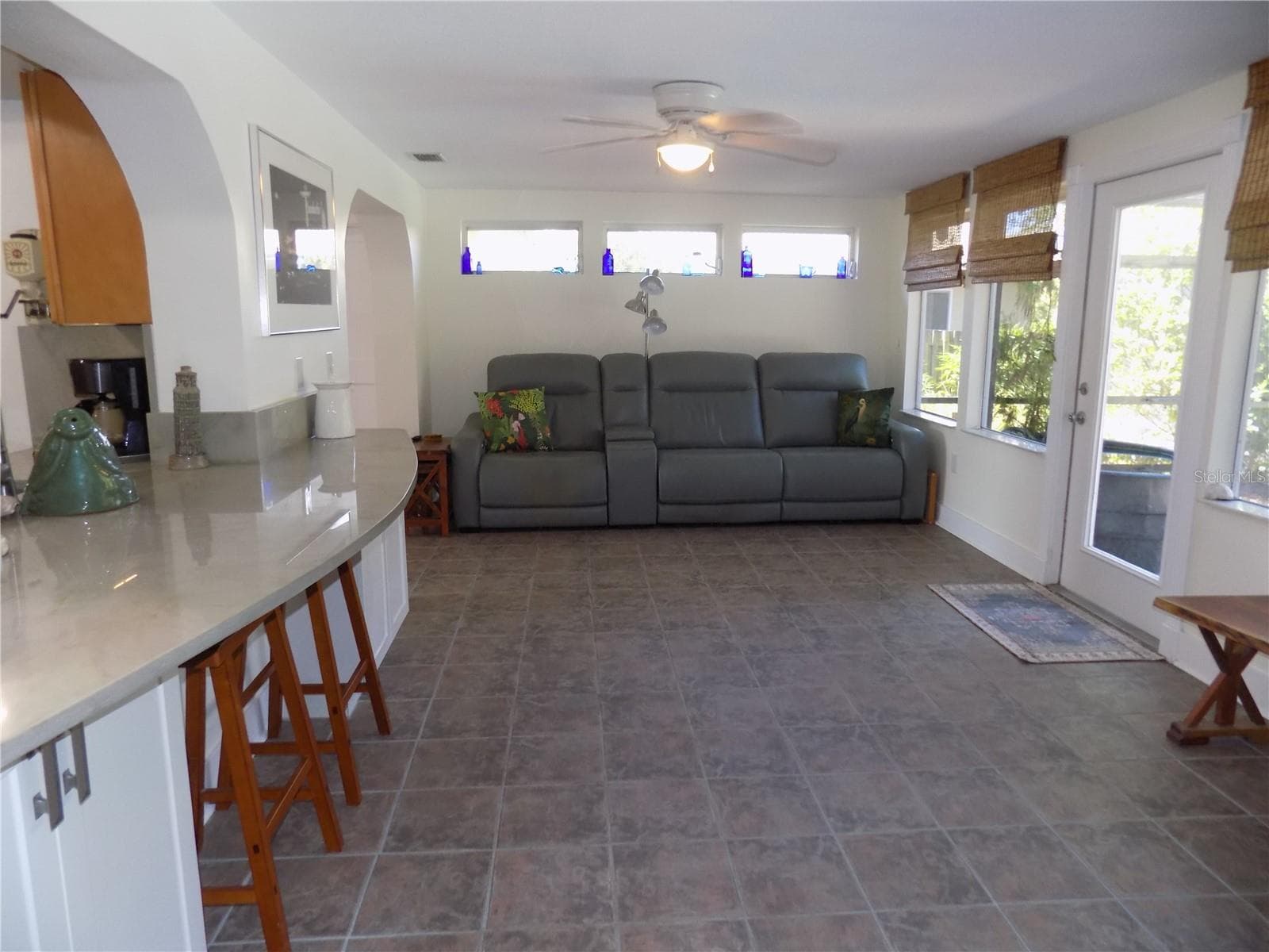Rear Family room with pass through from kitchen - 1874 WATEROAK DR W, CLEARWATER