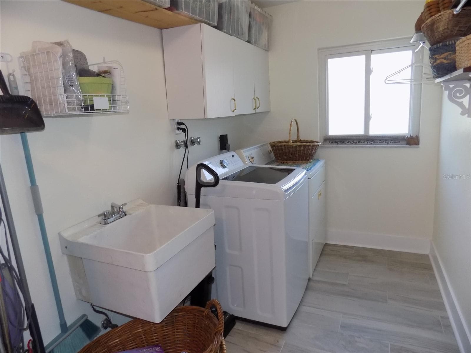 Inside laundry room - 1874 WATEROAK DR W, CLEARWATER