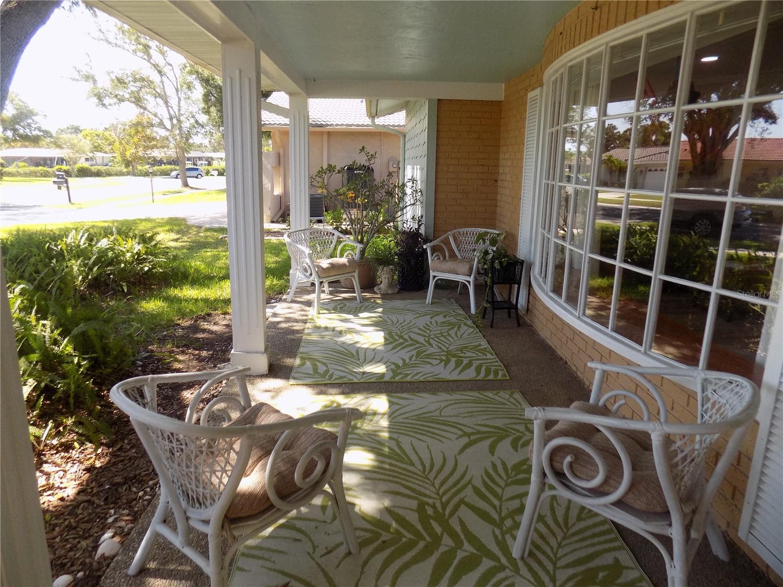 Covered front porch - 1874 WATEROAK DR W, CLEARWATER