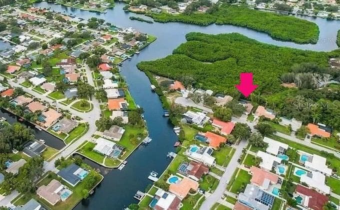 Drone view showing home location backing to preserve - 1874 WATEROAK DR W, CLEARWATER