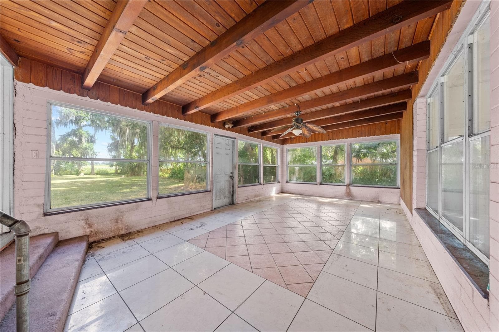 Sunroom that overlooks the lake. - 2557 AMES HAVEN RD, KISSIMMEE