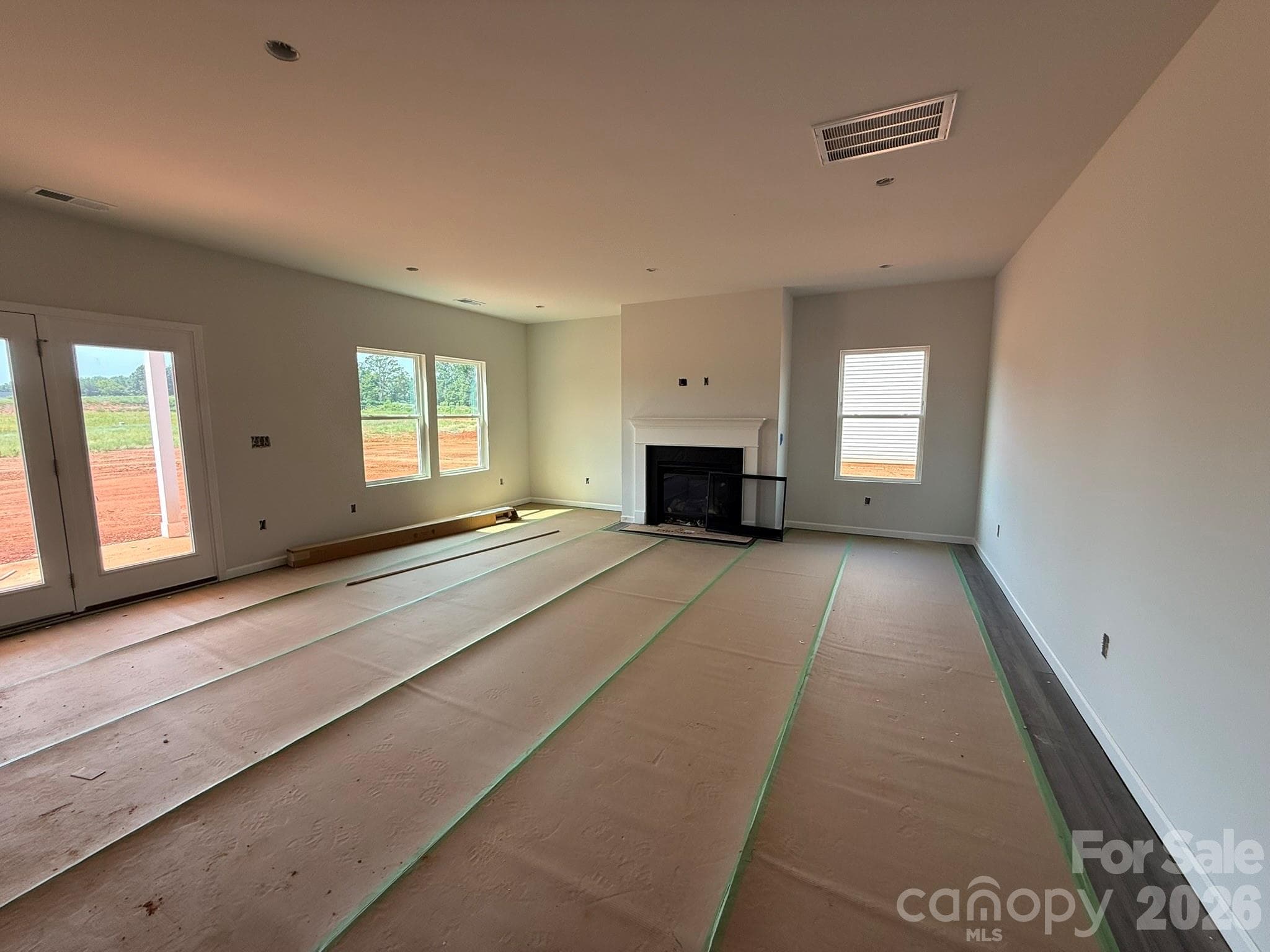 Spacious Family Room with Fireplace can be seen - 4017 Juno Drive, Charlotte