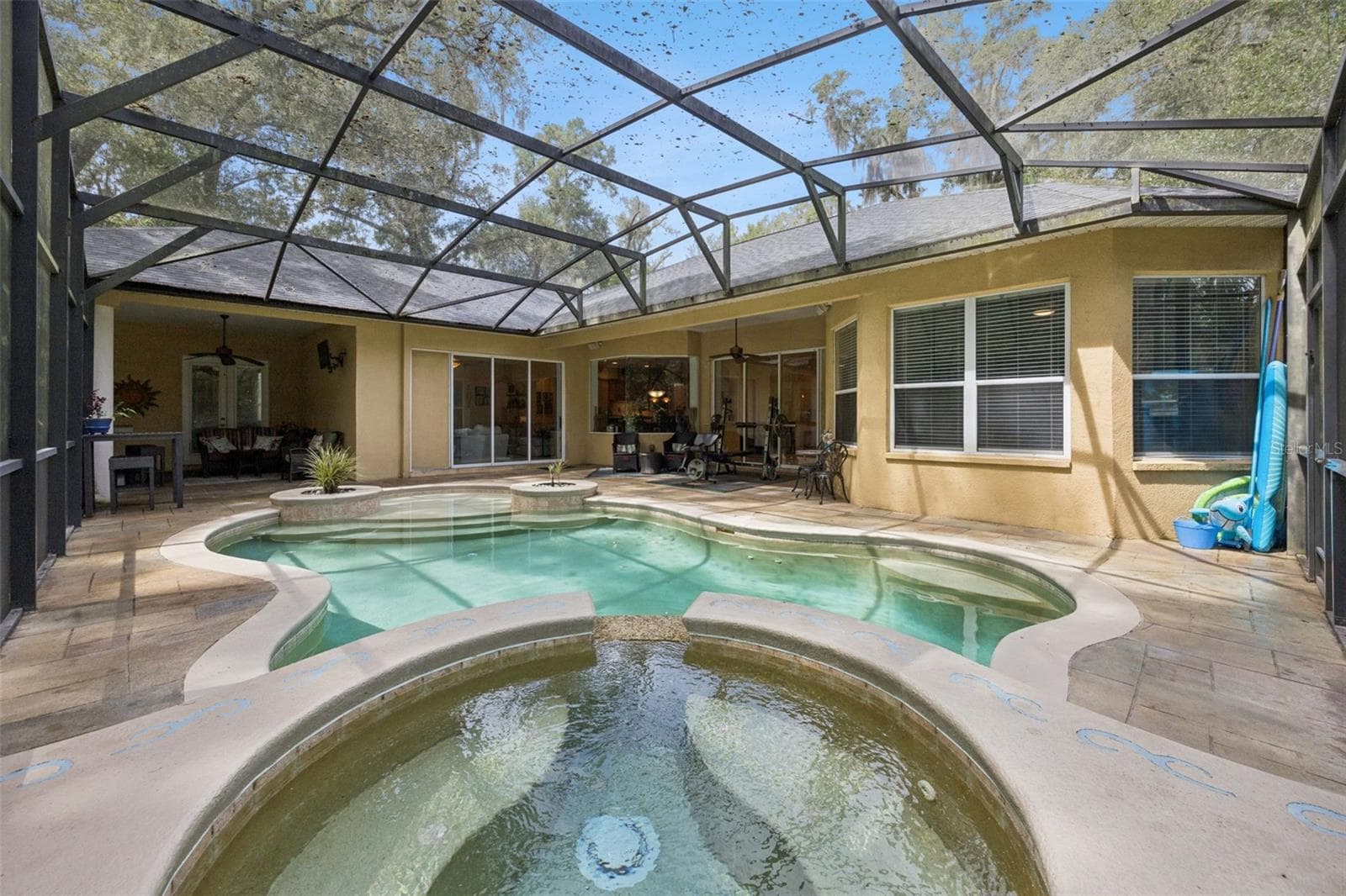 Pool, spa and expansive screened enclosure create an extension of the indoor living space. - 30440 JUBILEE WAY, SORRENTO