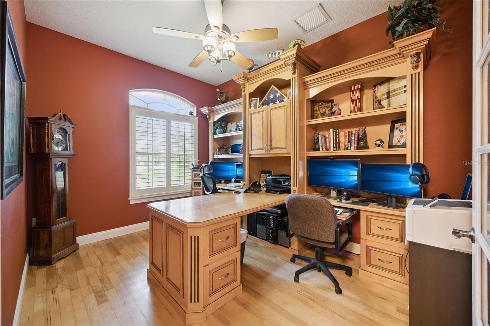 Dedicated home office features extensive built-in cabinetry, shelving and work surfaces. - 30440 JUBILEE WAY, SORRENTO