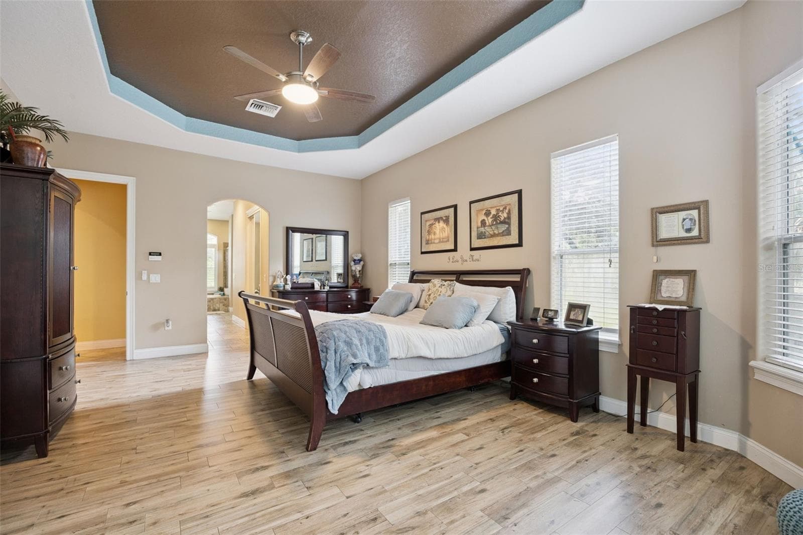 Primary bedroom offers generous proportions, multiple windows and a tray ceiling. - 30440 JUBILEE WAY, SORRENTO
