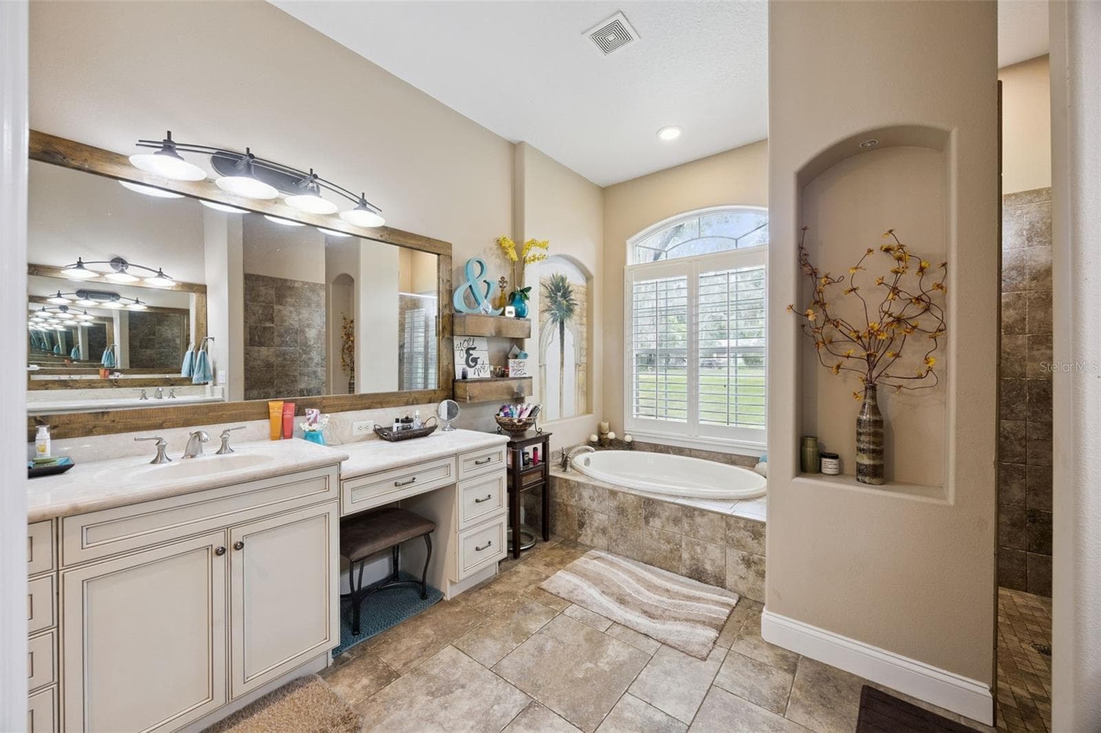 Primary bath includes dual vanities, soaking tub, walk-in shower and generous cabinetry. - 30440 JUBILEE WAY, SORRENTO