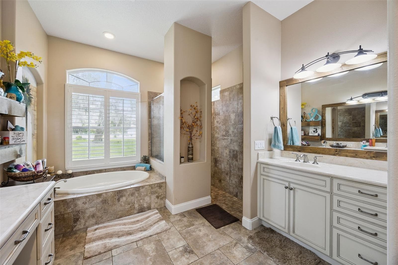 A second view of the primary bath highlights the natural light and spacious layout. - 30440 JUBILEE WAY, SORRENTO