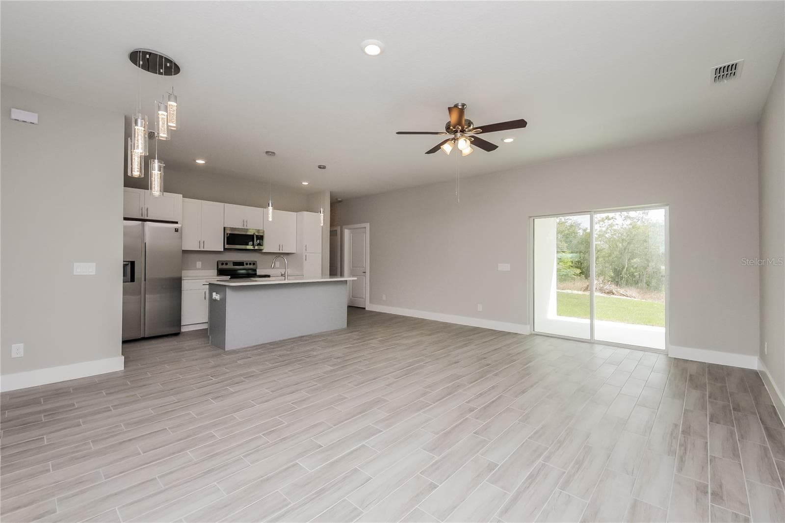 Single Family Residence at 363 ELDERBERRY CT, POINCIANA, photo 3 of 15