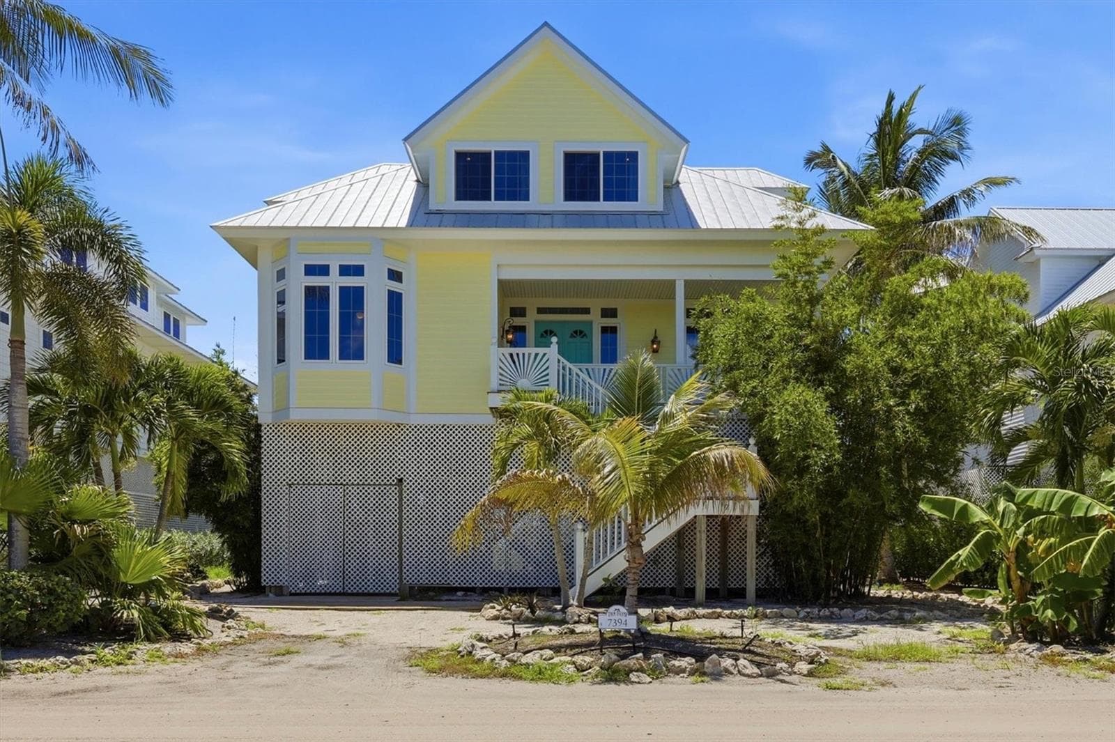 Elegant coast facade with impact windows - 7394 PALM ISLAND DR, PLACIDA