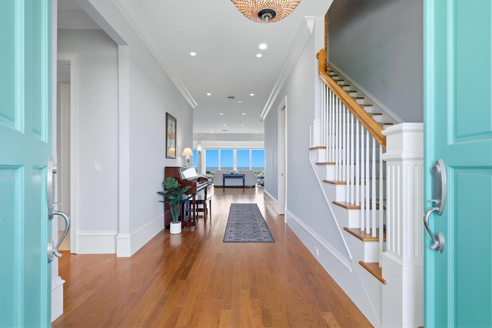 Grand entry with natural light and custom millwork - 7394 PALM ISLAND DR, PLACIDA