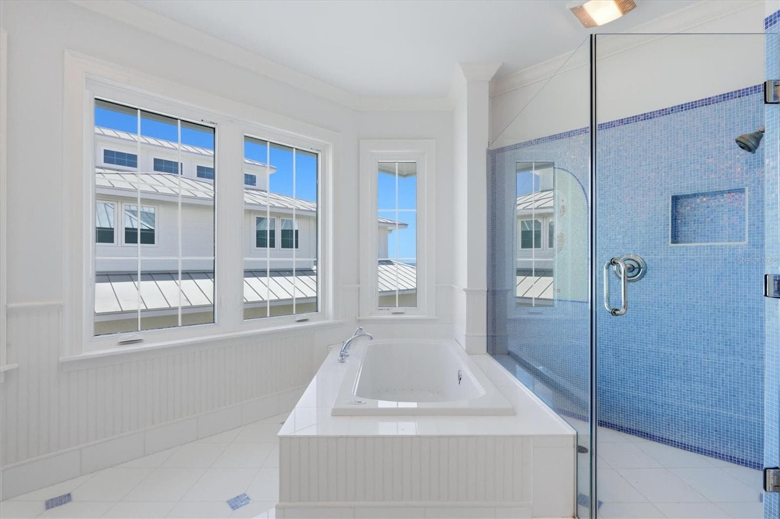 Primary bath with Gulf views and a soaking tub - 7394 PALM ISLAND DR, PLACIDA