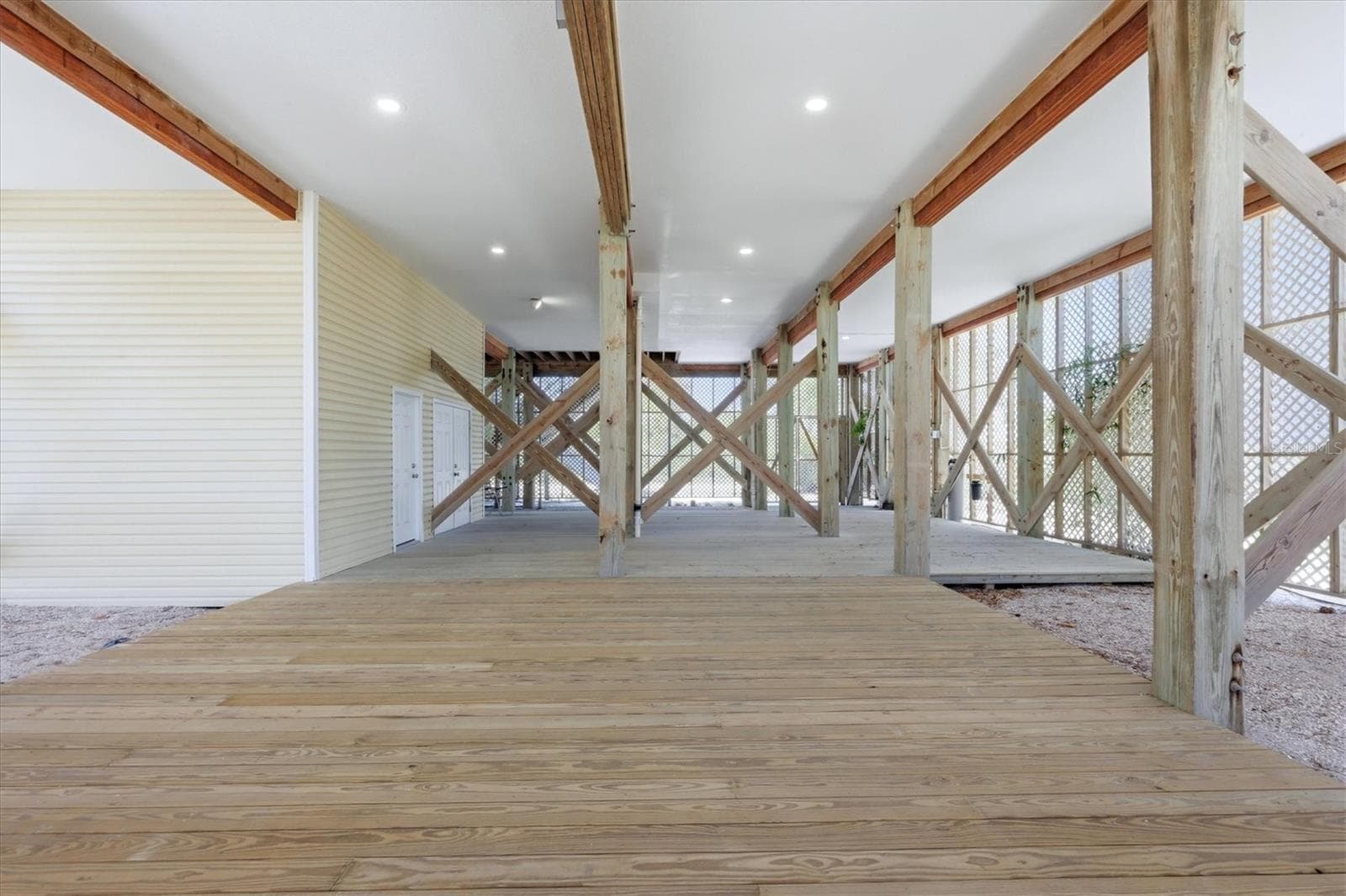 With golf cart garage and storage area - 7394 PALM ISLAND DR, PLACIDA
