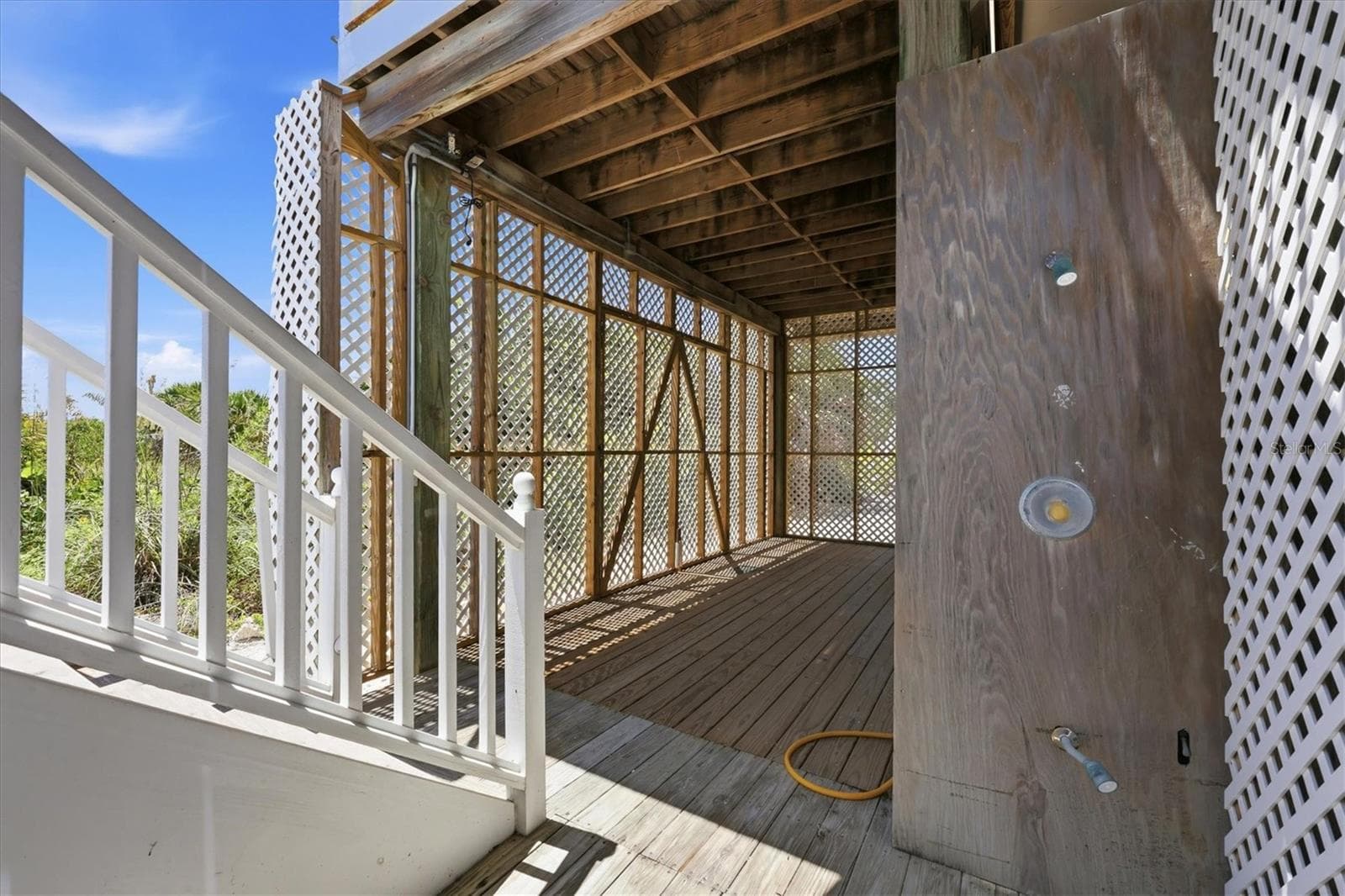 Shower and access from the main level deck - 7394 PALM ISLAND DR, PLACIDA