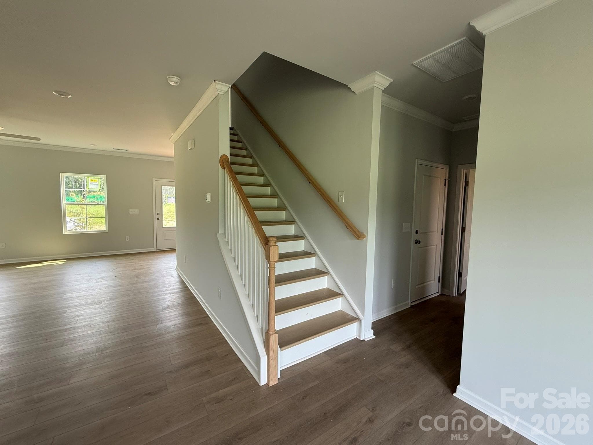 Stairs positioned in the middle of the home - 1231 Bansal Drive, Charlotte