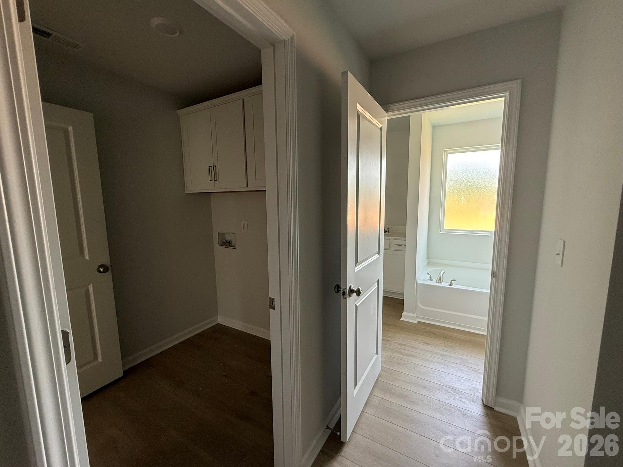 Direct access to the Laundry Room through Primary Closet - 1305 Bansal Drive, Charlotte