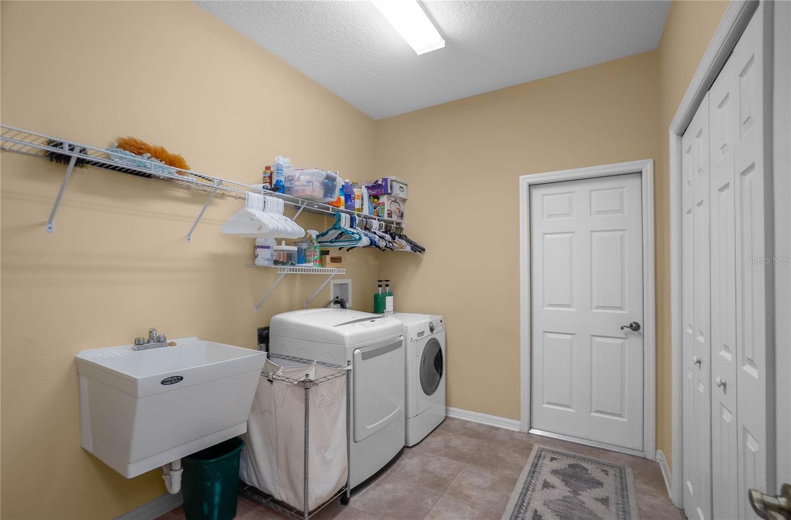 Inside Laundry Room off kitchen area - 9807 E LAKE TAHOE DR, INVERNESS