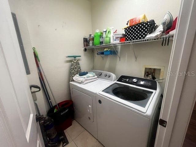 Laundry room with washer and dryer - 98 VIVANTE BLVD #9834, PUNTA GORDA