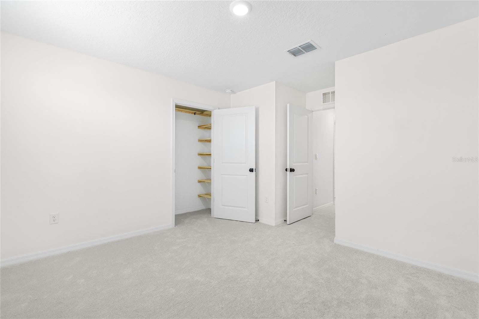 bedroom 2 has custom closet shelving - 12272 HIGH ROCK WAY, PARRISH