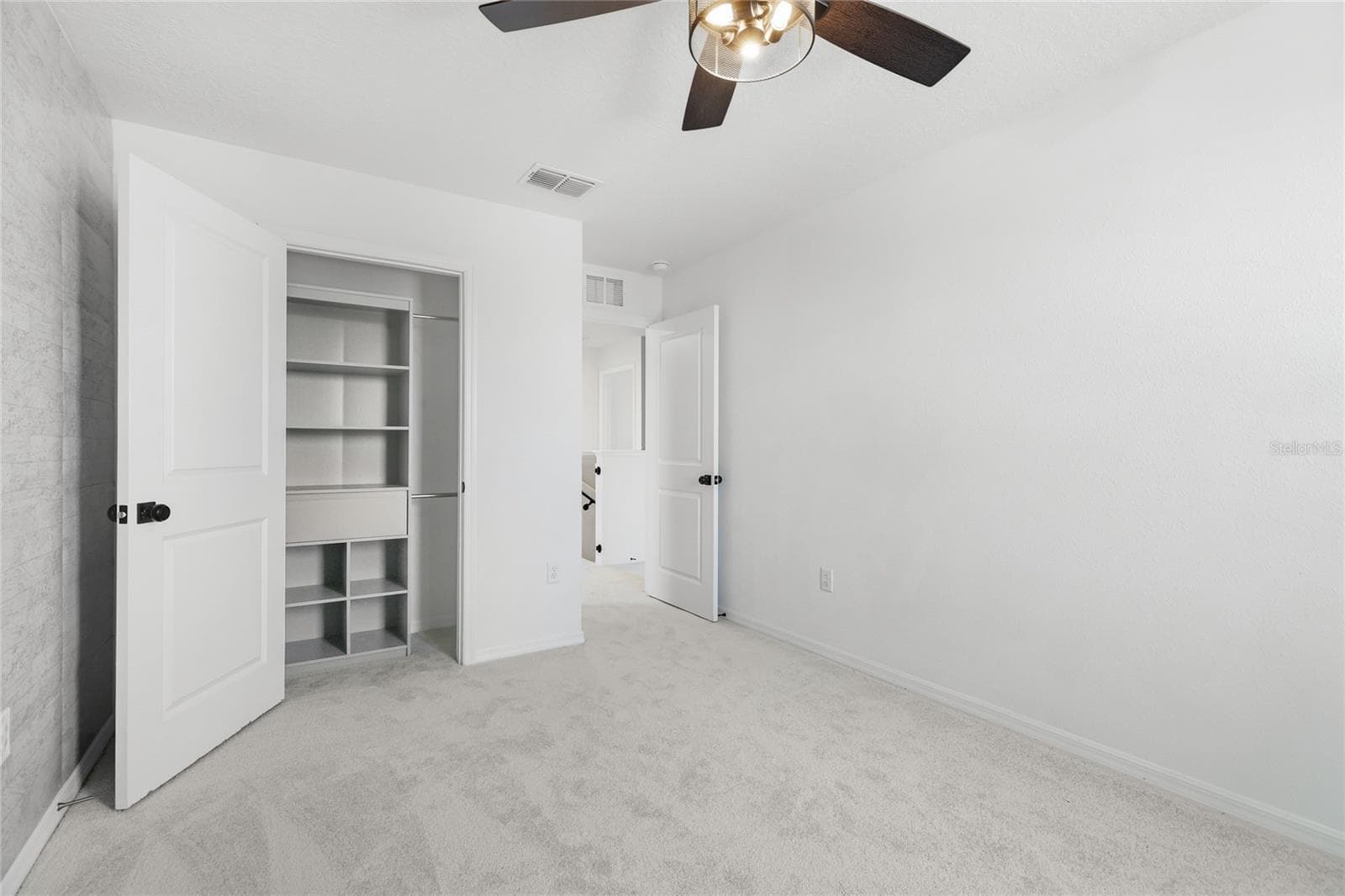 bedroom 2 w/ built in closet shelving - 12272 HIGH ROCK WAY, PARRISH
