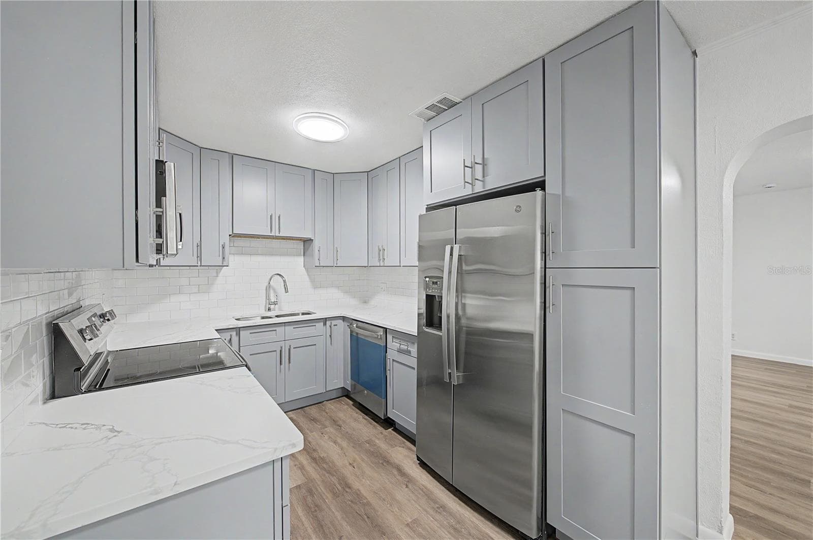 Gorgeous new kitchen, All New Appliances, Backsplash, Paint, Flooring and Light fixtures! - 810 E 120TH AVE, TAMPA