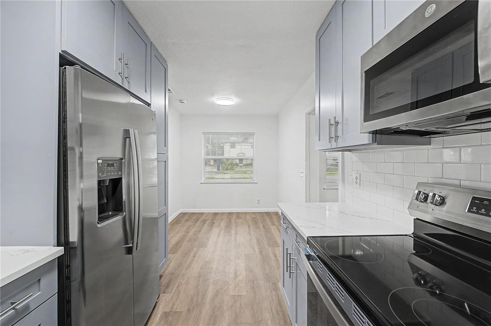 Gorgeous new kitchen, All New Appliances, Backsplash, Paint, Flooring and Light fixtures! - 810 E 120TH AVE, TAMPA