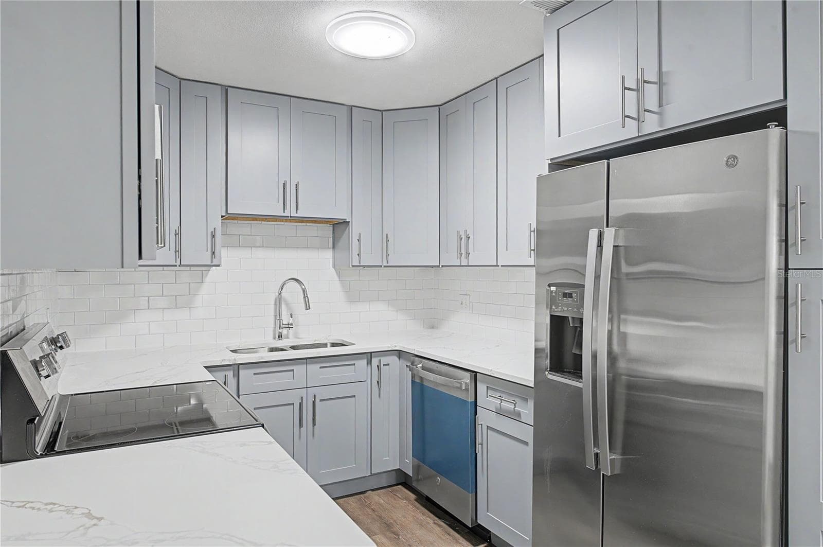 Gorgeous new kitchen, All New Appliances, Backsplash, Paint, Flooring and Light fixtures! - 810 E 120TH AVE, TAMPA