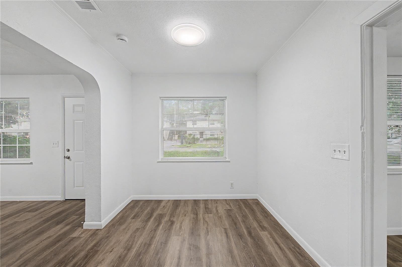 Dinette area, new flooring, blinds and light fixture. - 810 E 120TH AVE, TAMPA