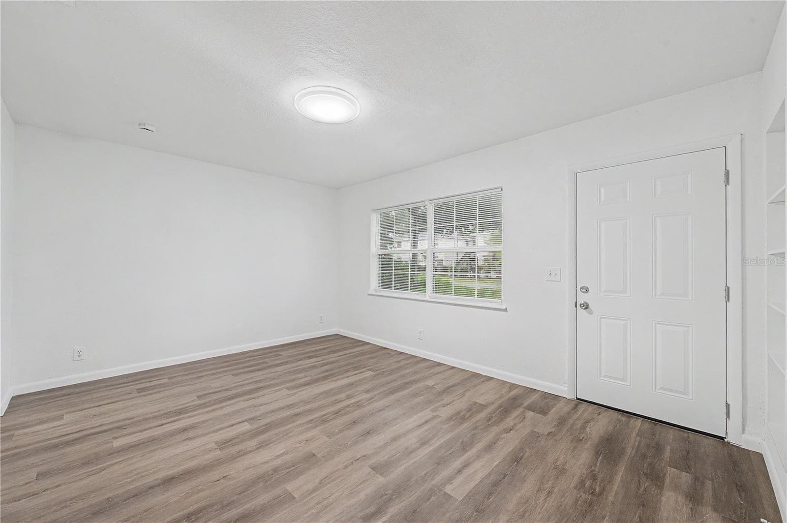 Front Entry: Great Room:New Flooring, Paint and Light fixtures. - 810 E 120TH AVE, TAMPA