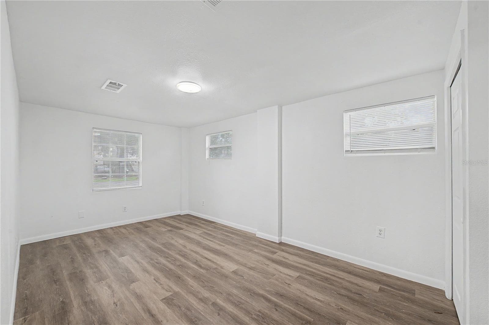 Guest Bedroom, New Flooring, Paint and Light fixture. - 810 E 120TH AVE, TAMPA