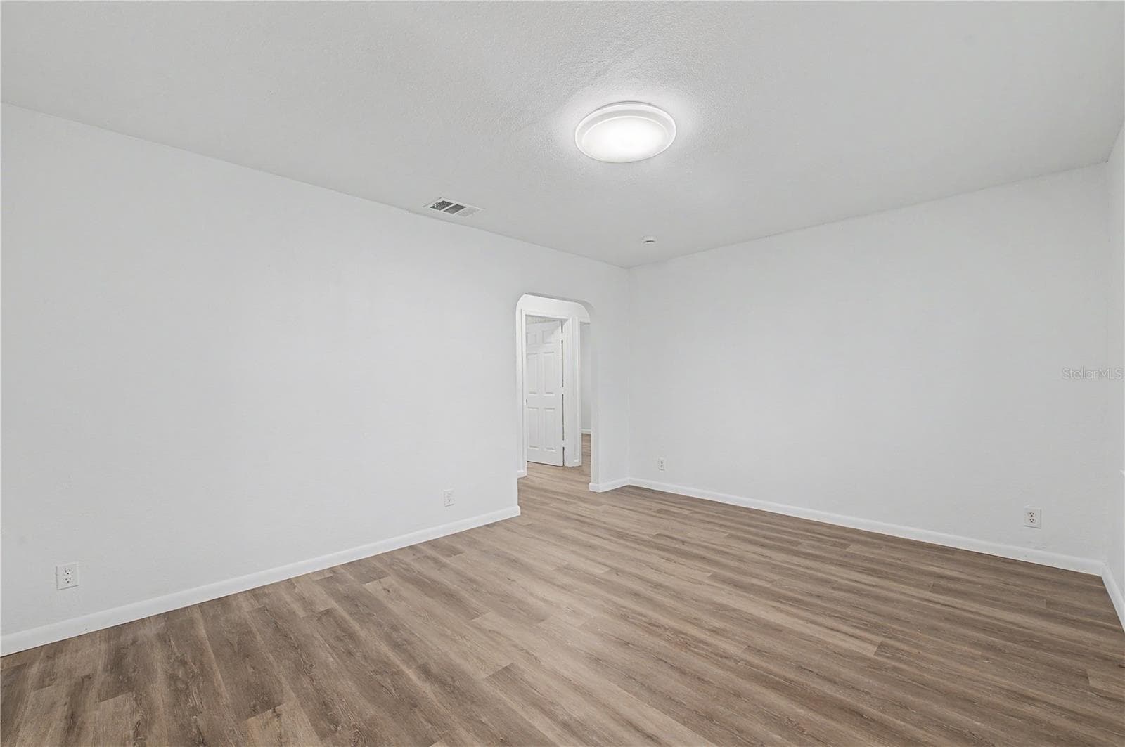 Guest Bedroom, New Flooring, Paint and Light fixture. - 810 E 120TH AVE, TAMPA