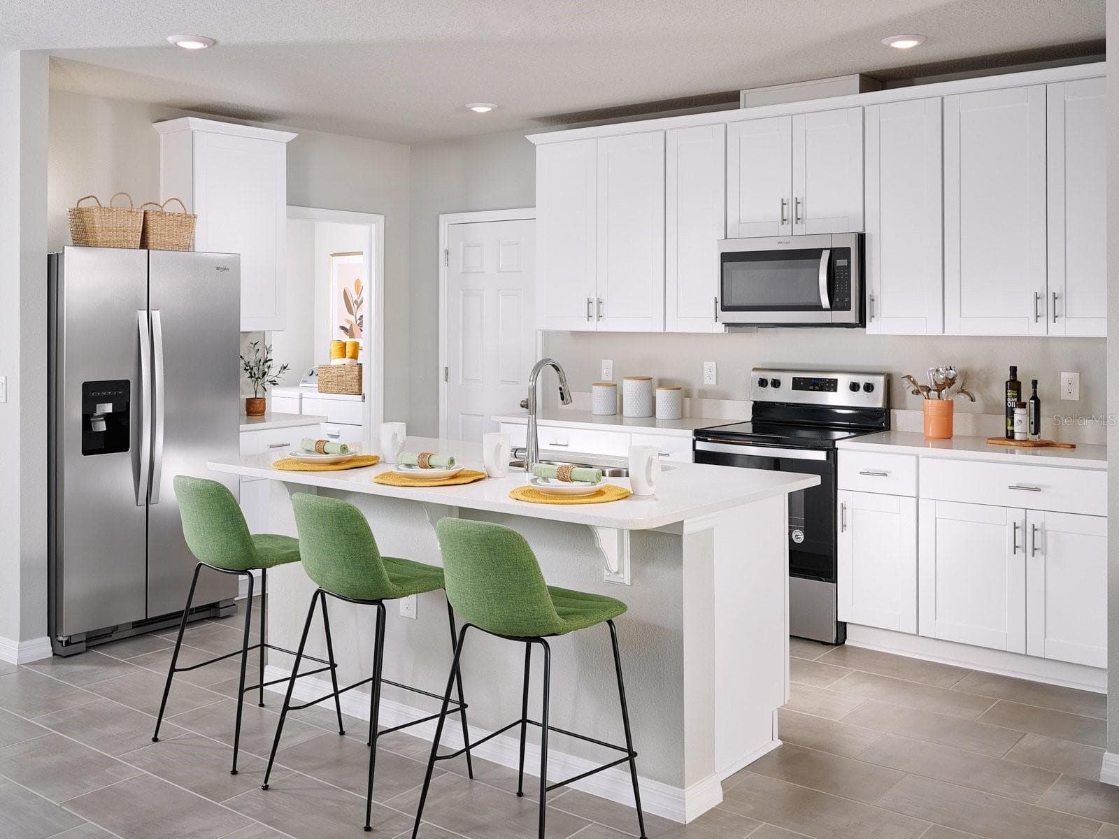 Photo is not of the actual home, but is an inspirational photo of builder’s model home and may depict options, furnishings, and/or decorator features that are not included. - 721 IMPALA RD, LAKE ALFRED