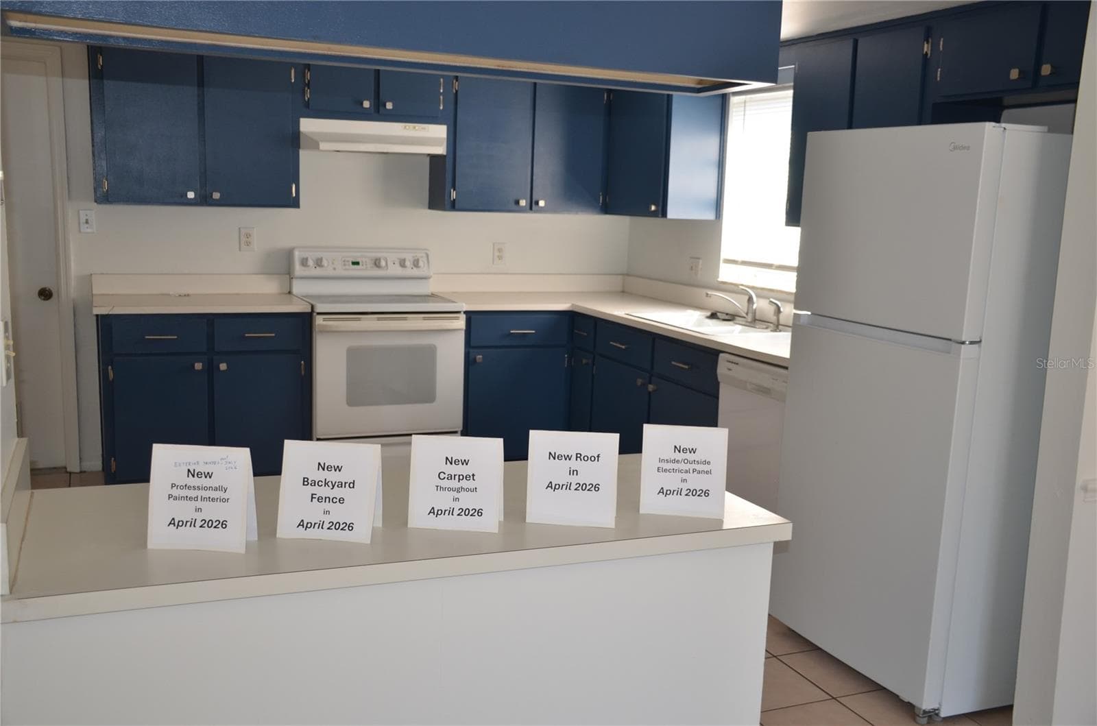 Kitchen with Cards showing Improvements - 5060 ANDREA BLVD, ORLANDO